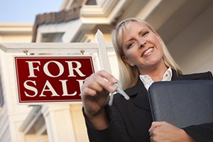 Female Real Estate Agent with Keys