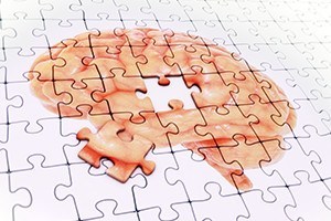 Brain jigsaw puzzle memory concept