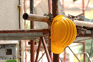 Yellow helmet on tubular scaffolding