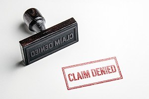 Rubber stamping that says claim denied
