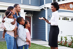 Real estate agent showing a family house