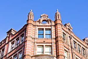 A well maintained red brick building