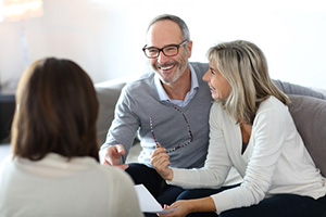 Senior couple meeting financial adviser