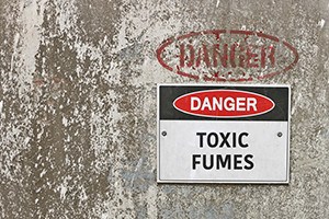 Red black and white danger toxic fums warning