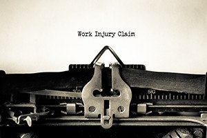 Work injury claim typed on a vintage typerwriter