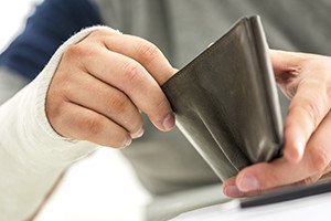 Man holding an open wallet