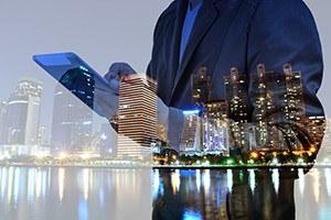 Double exposure of Night city and business man