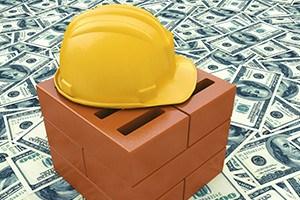 Construction businessman with a yellow hardhat helmet